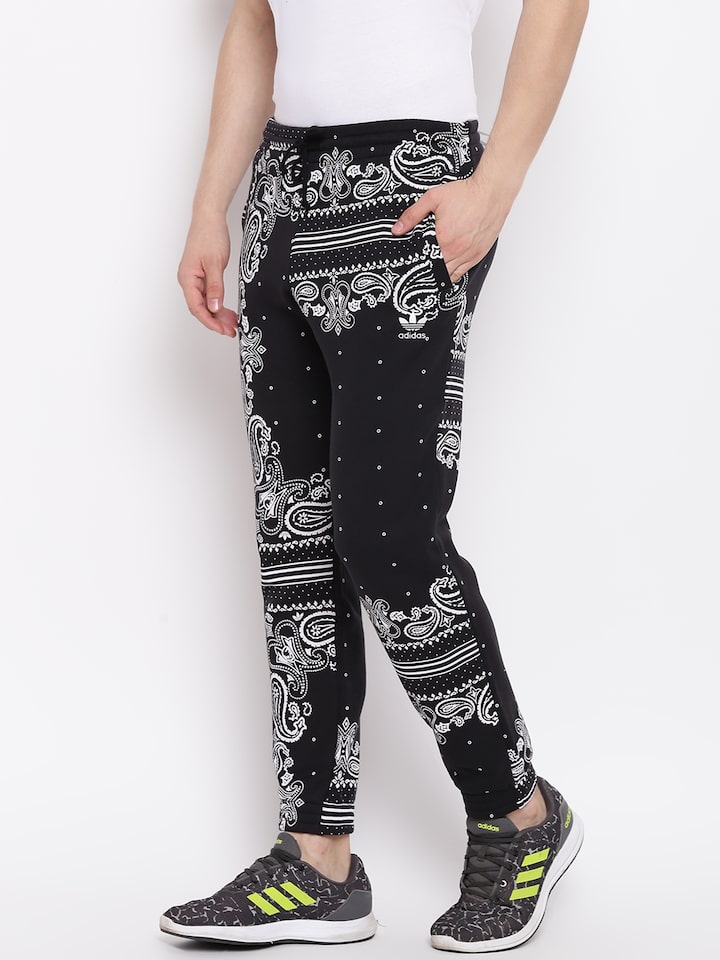 Buy Bandana Print Cotton Stretch Twill Joggers (B&T) Men's Jeans & Pants  from Buyers Picks. Find Buyers Picks fashion & more at DrJays.com