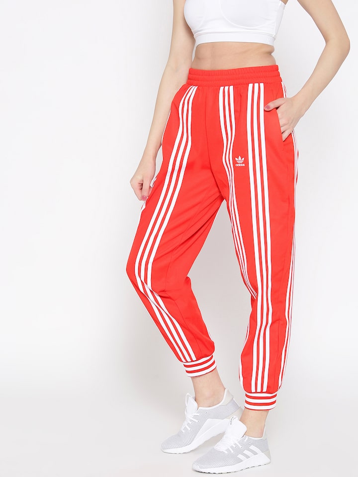 womens red adidas pants with white stripes