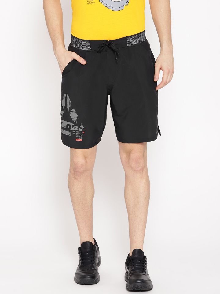 Saucer lodret vedlægge Buy Reebok Men Black Solid OST Epic Lightweight Training Shorts - Shorts  for Men 8972795 | Myntra