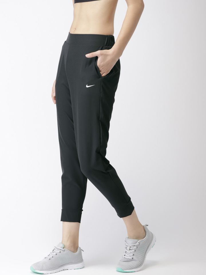Buy Nike Women Black Slim Fit Solid BLISS DRI FIT Cropped Joggers Pants for Women | Myntra