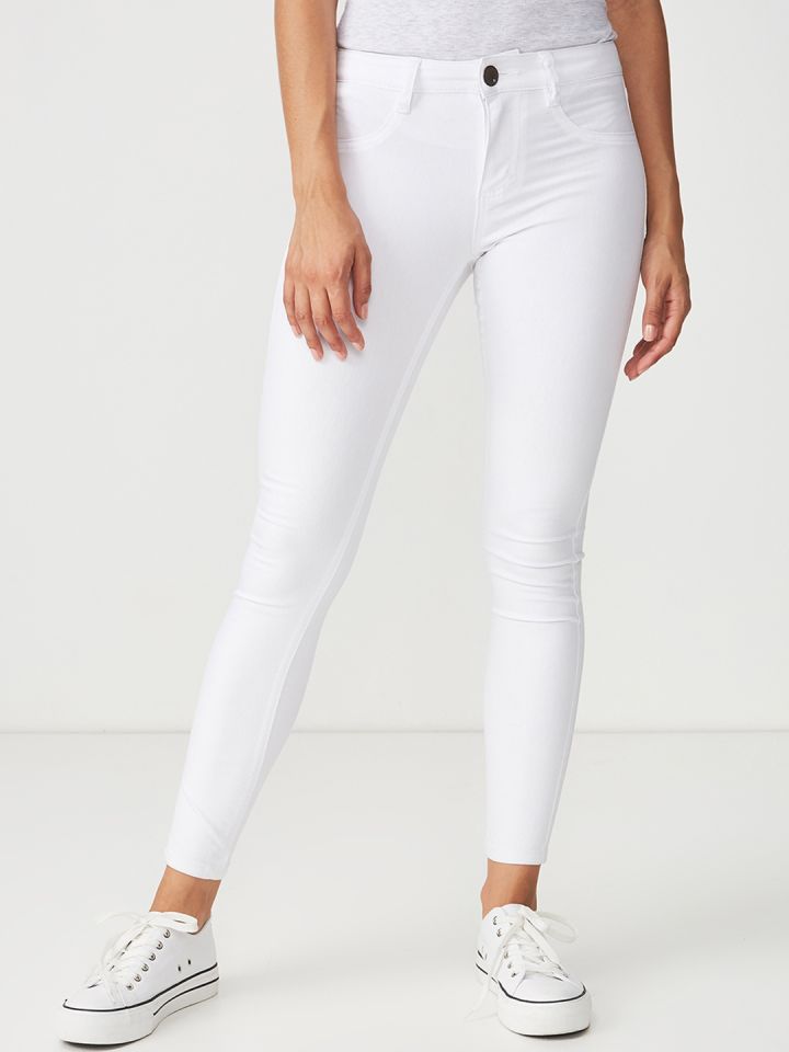 mid rise white skinny jeans
