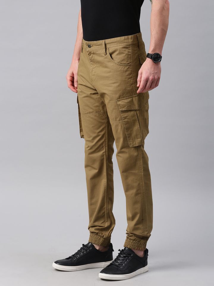 Buy Peter England Men Brown Solid Slim fit Regular trousers Online at Low  Prices in India  Paytmmallcom