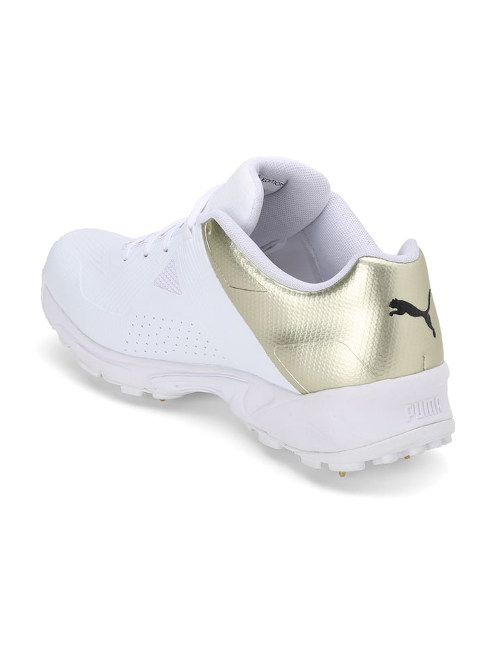puma one8 gold spikes