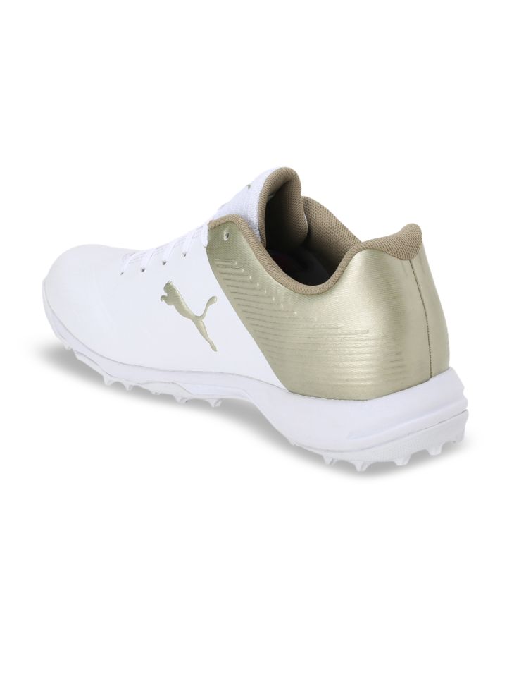 Puma gold cricket shoes store