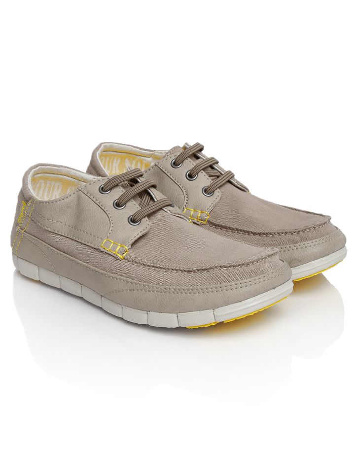Buy Crocs Men Beige Casual Shoes Myntra