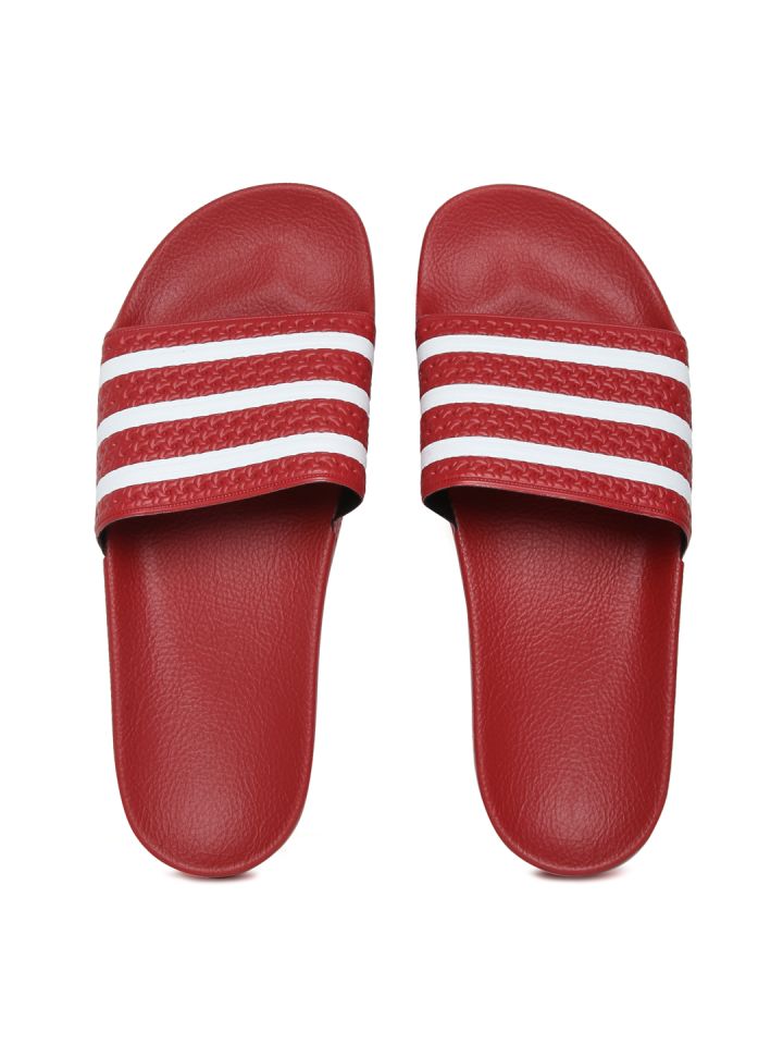 red adidas flip flops