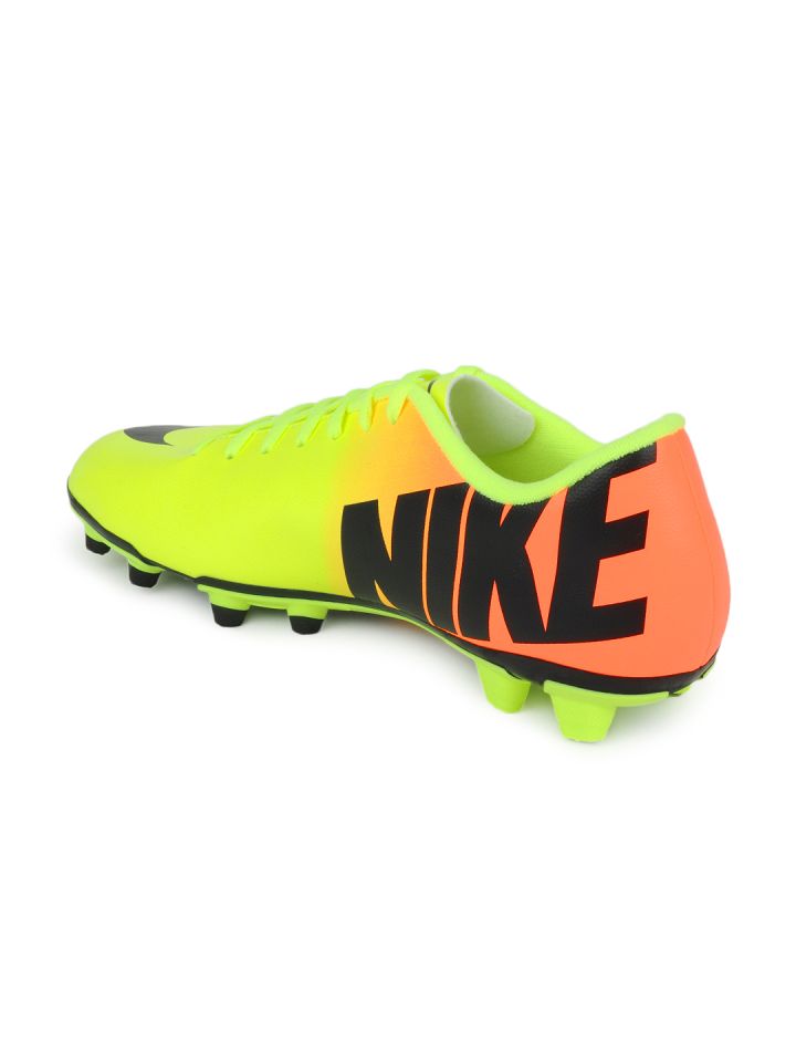 Green and orange nike cleats top