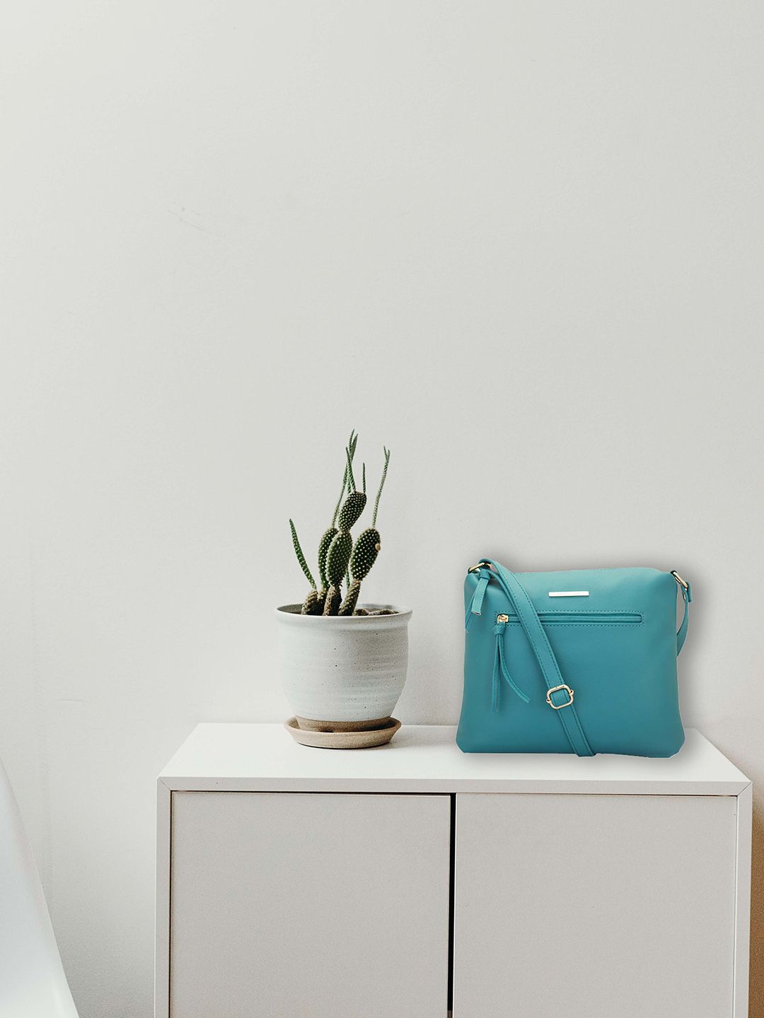 Lapis O Lupo Turquoise Blue Solid Sling Bag