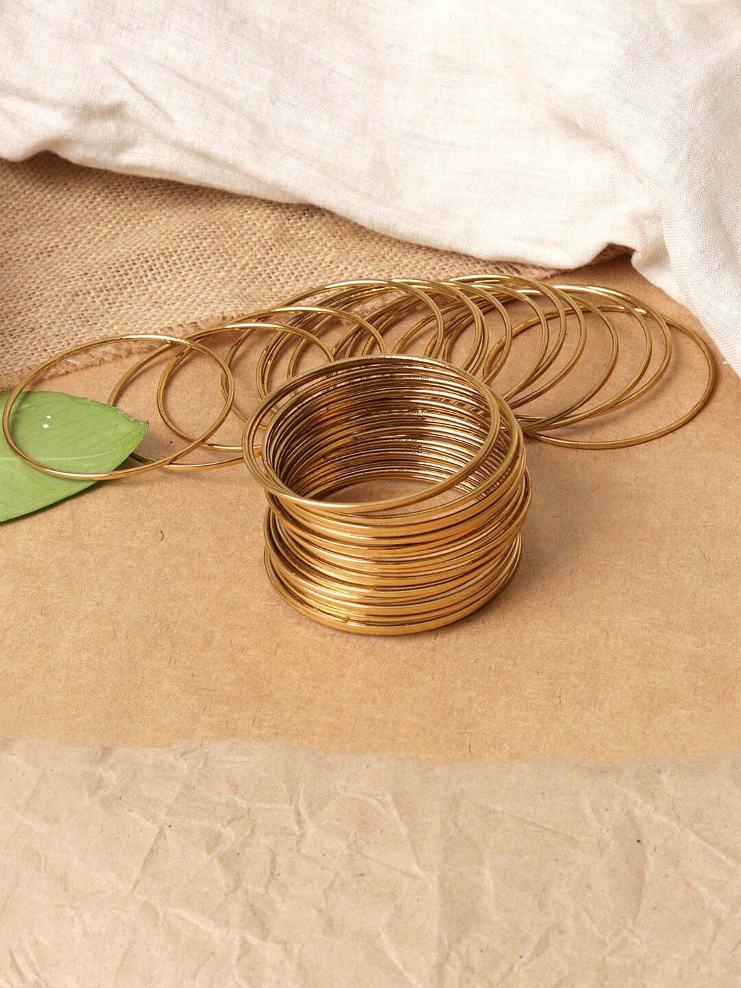 ToniQ Set Of 18 Gold-Plated Antique Bangles