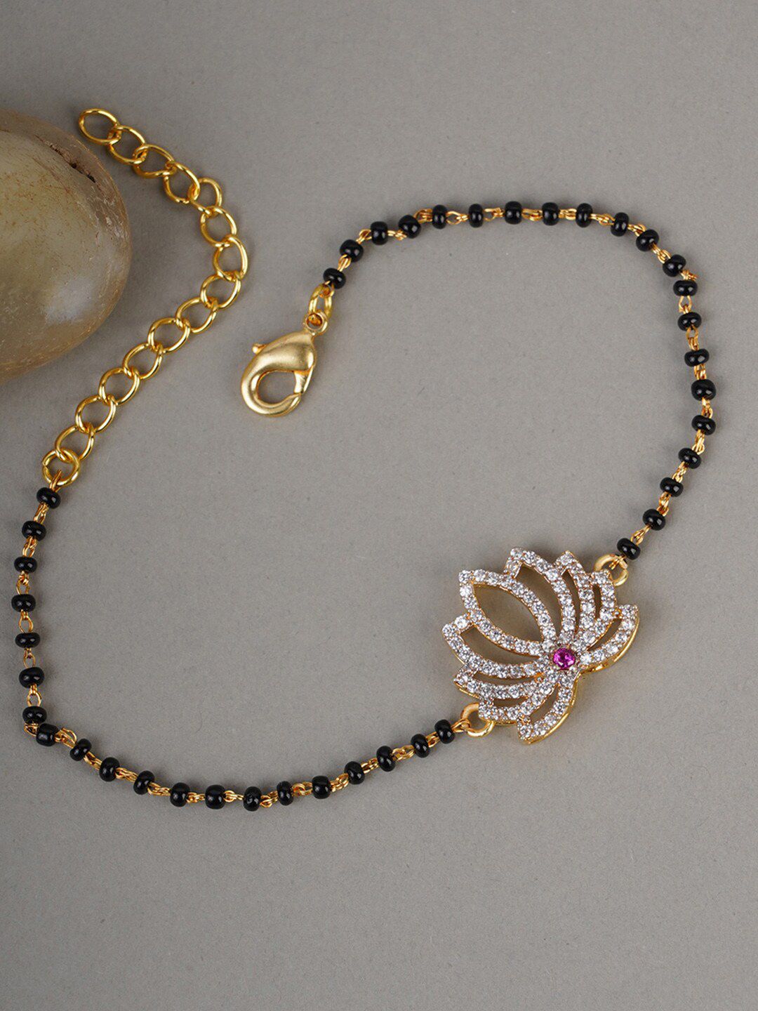 Shimmering Floret CZ Silver Studded Mangalsutra Bracelet with Black Beads Gold Plated Chain