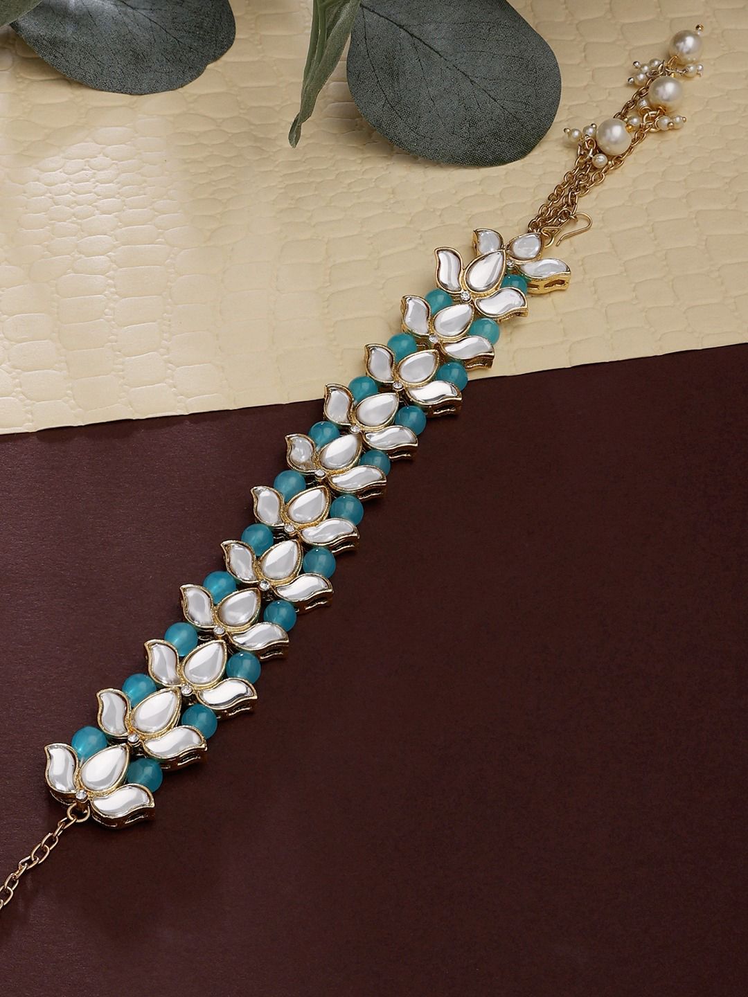Zaveri Pearls Women Gold Toned Turquoise Blue Beaded Kundan Lotus Design Ethnic Bracelet