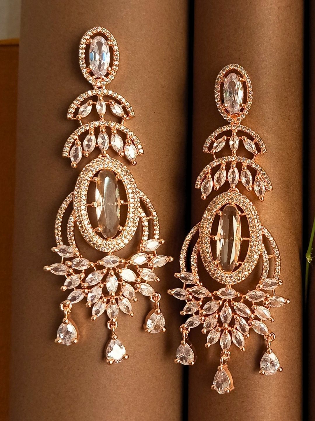 IKSAVA Rose Gold Plated American Diamond Studded Spherical Shaped Drop Earrings