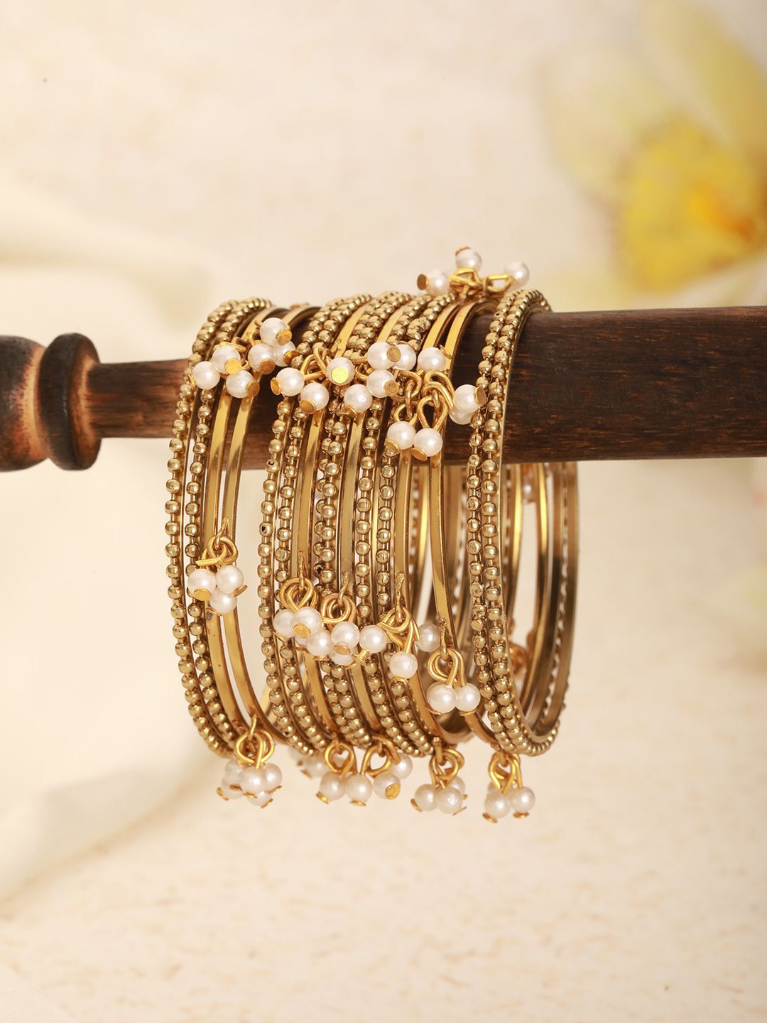 Jazz and Sizzle Set Of 12 Gold-Plated Artificial Beaded Bangles