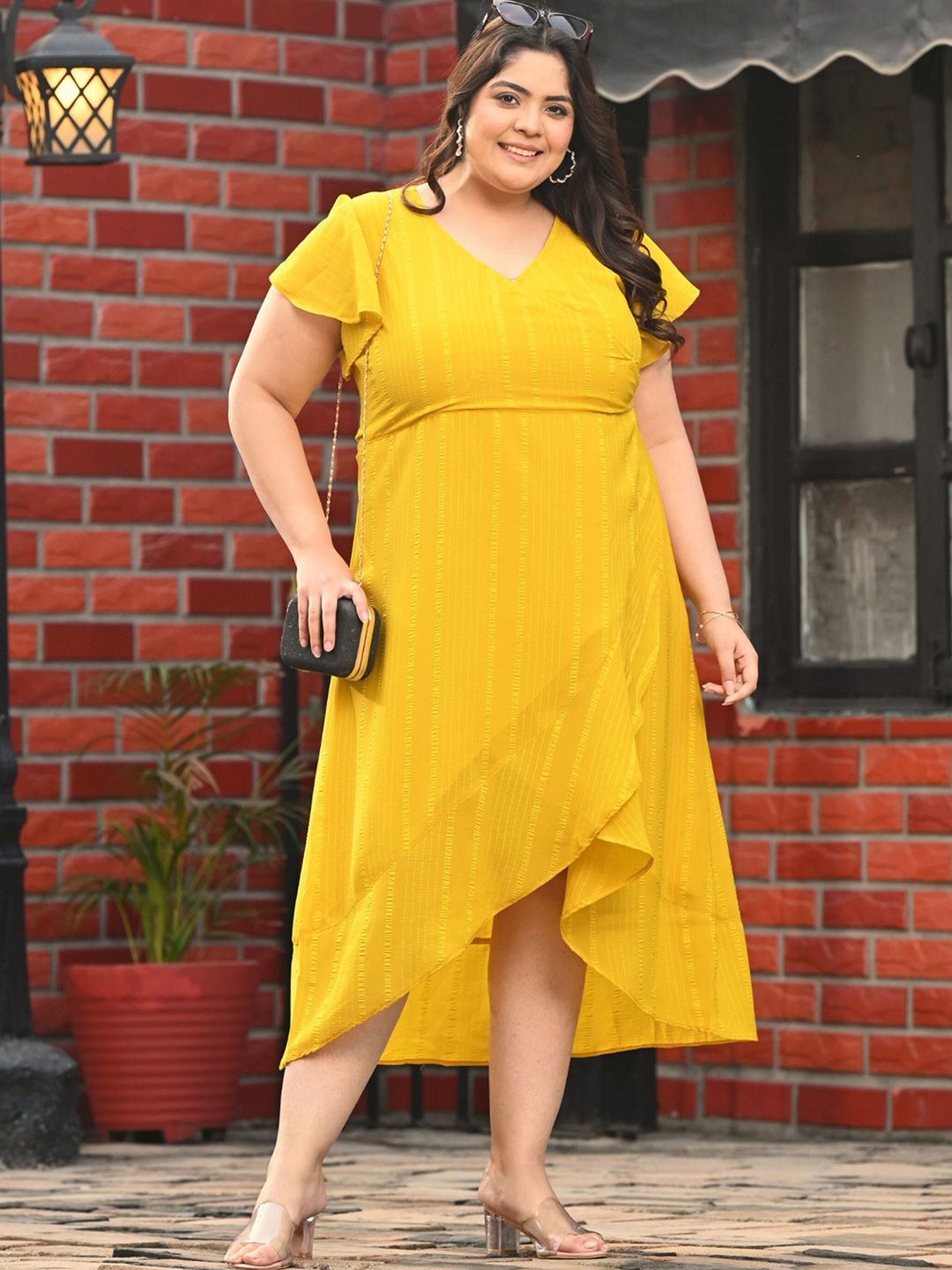 PrettyPlus by Desinoor.com Women Plus Size Yellow Flared Sleeve Wrap Georgette Dress