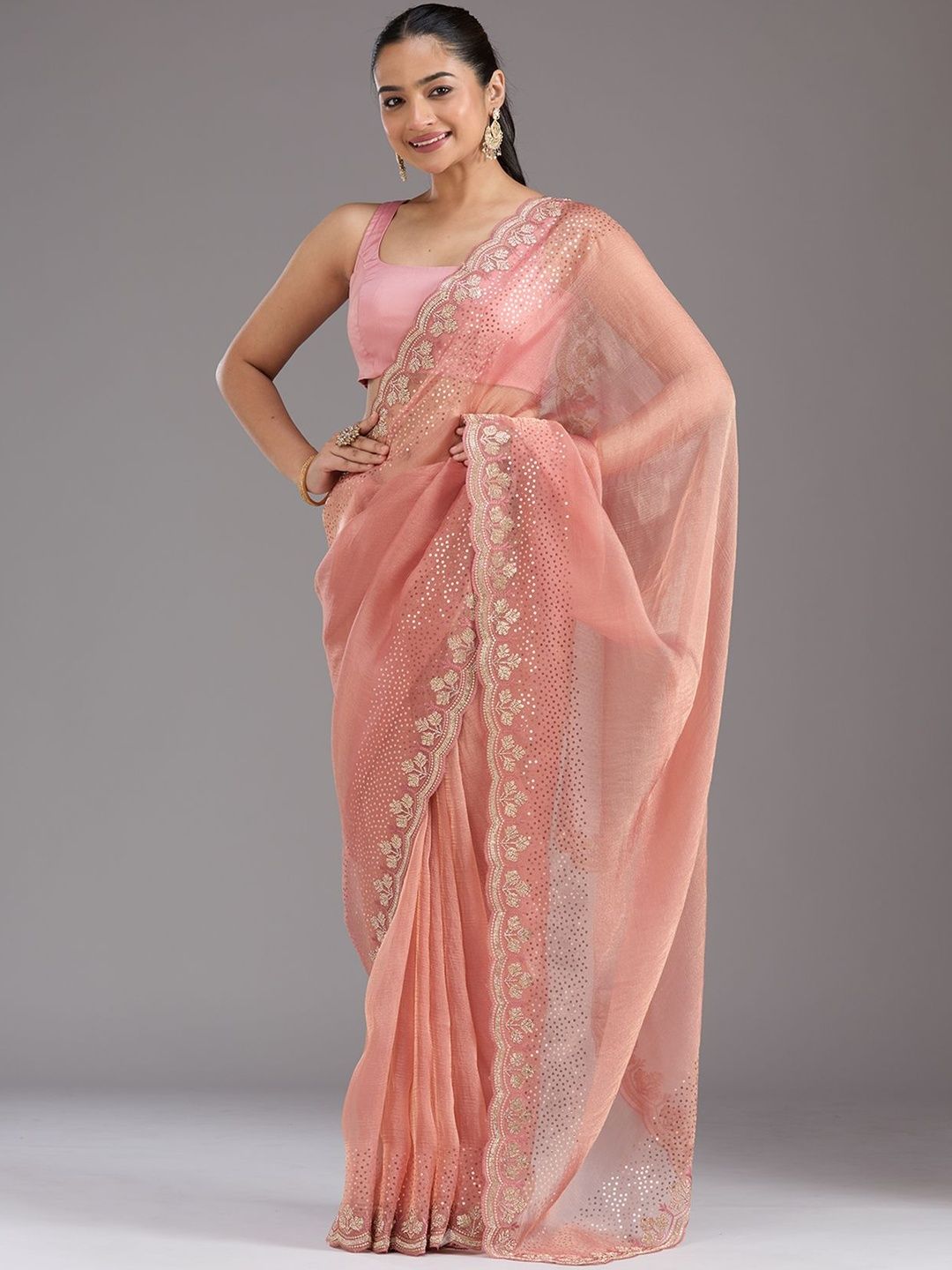 Koskii Women Stonework Peach Tissue Saree With Unstitched Blouse