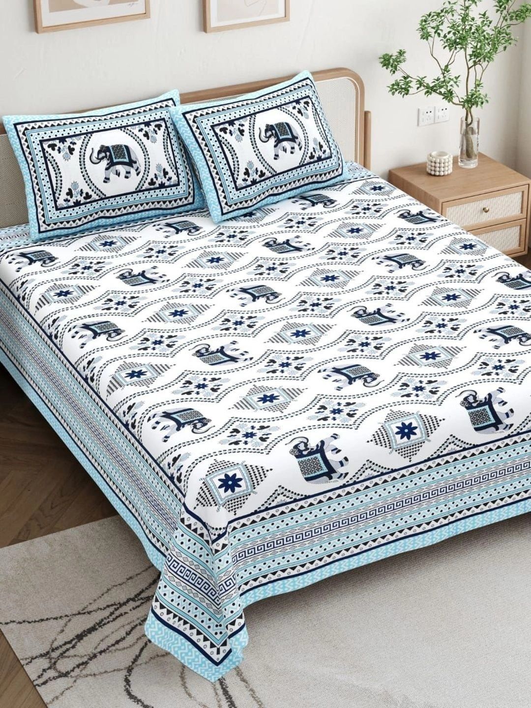 Buy Myntra Elegant Homes White & Blue Floral 180 TC King Bedsheet With 2 Pillow Covers -  - Home for Unisex