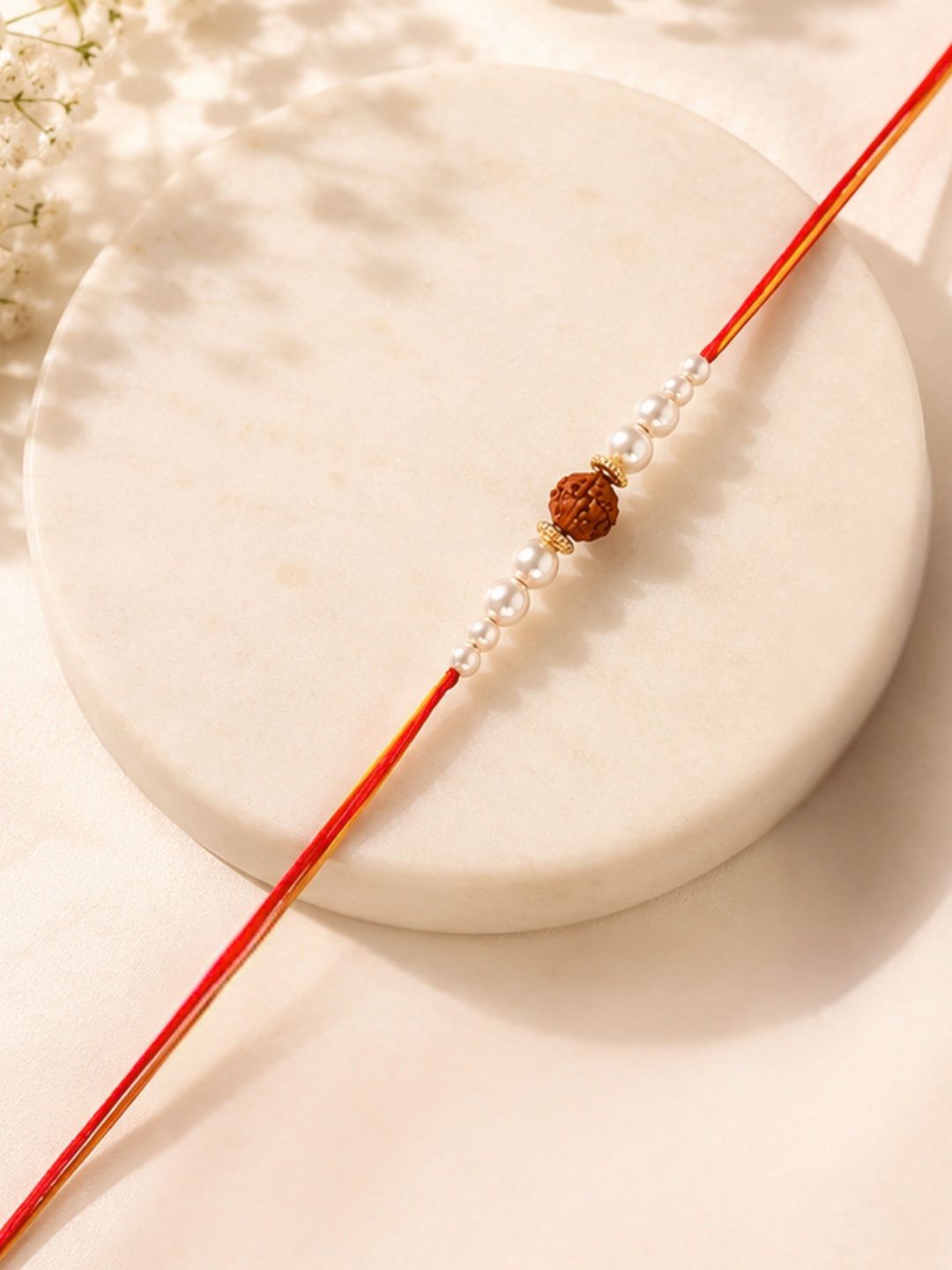 AccessHer Red & White Pearl Studded Rudraksh Rakhi with Roli Chawal & Greetings Card