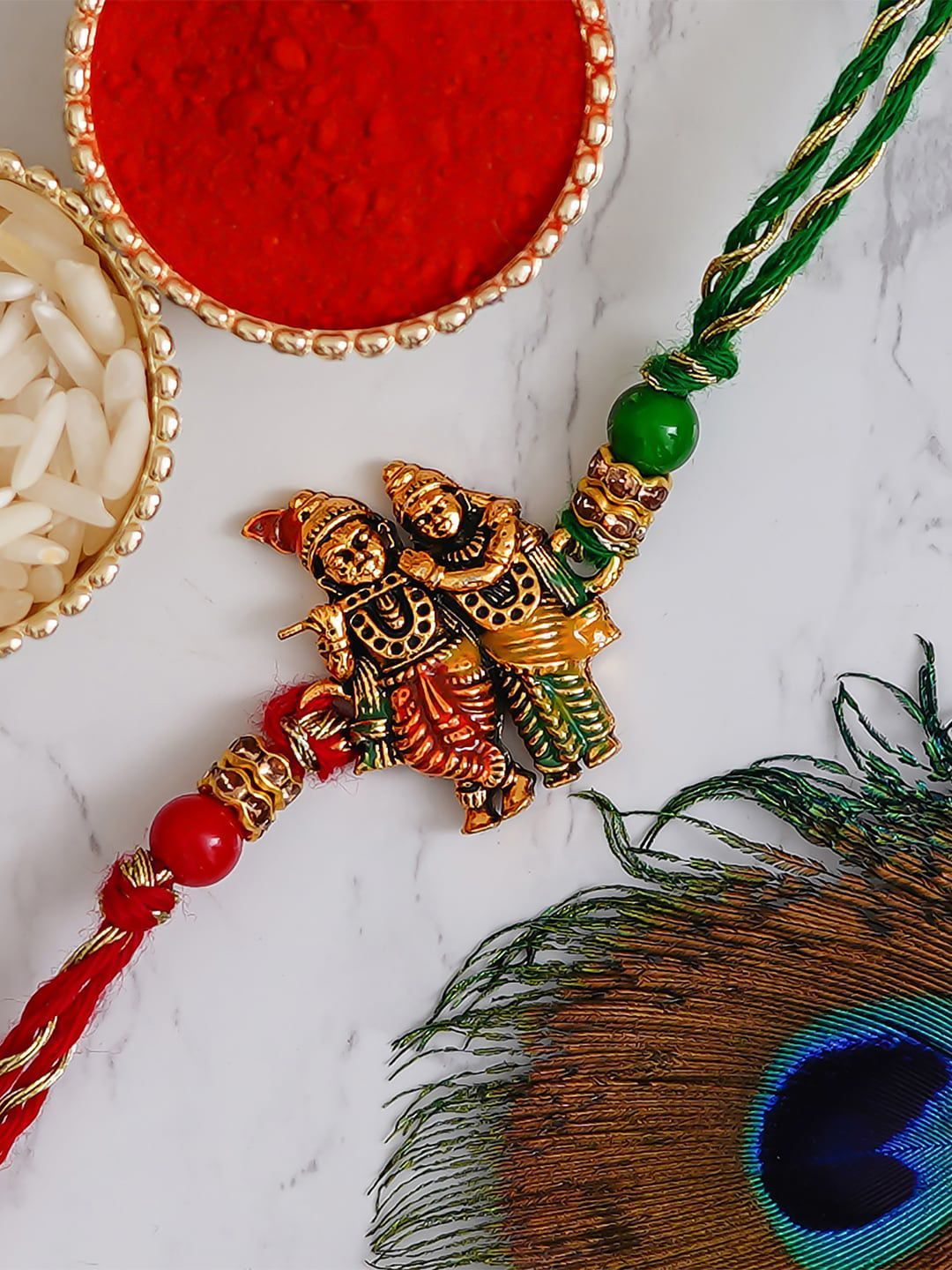 eCraftIndia Red & Green Beaded Radha Krishna With Roli Chawal