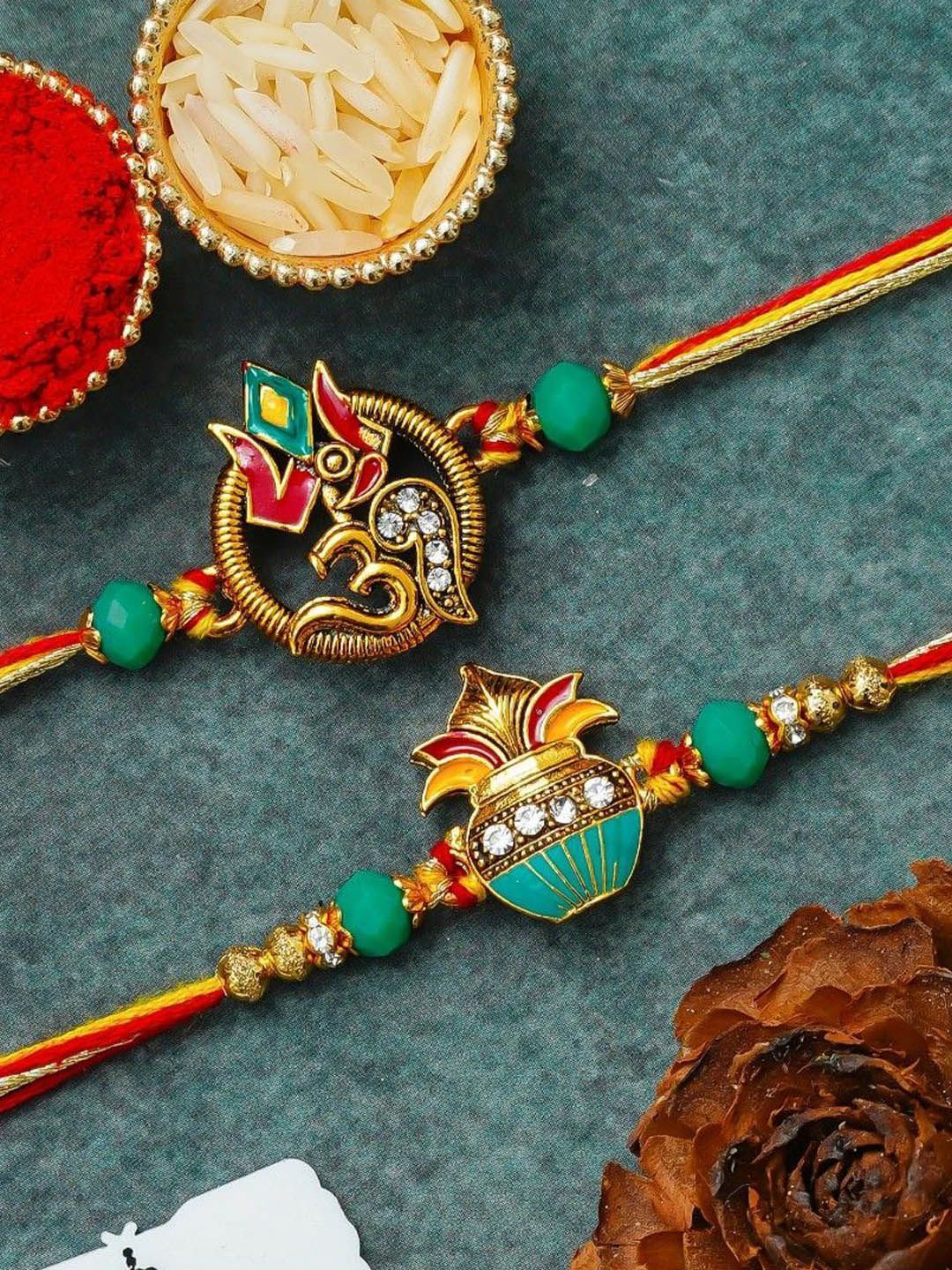 eCraftIndia Set Of 2 Stones Studded Kalash Om Design Thread Rakhi