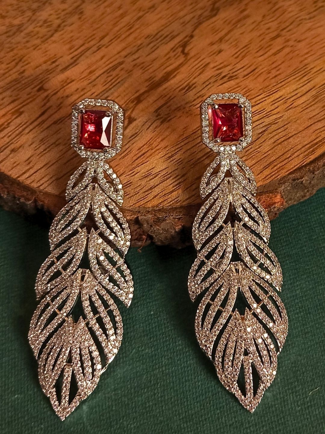 IKSAVA Silver Plated American Diamond Studded Leaf Shaped Drop Earrings