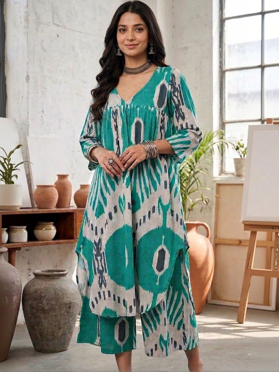 UGMAZ Women Printed Tiered Pure Cotton Kurta with Trousers
