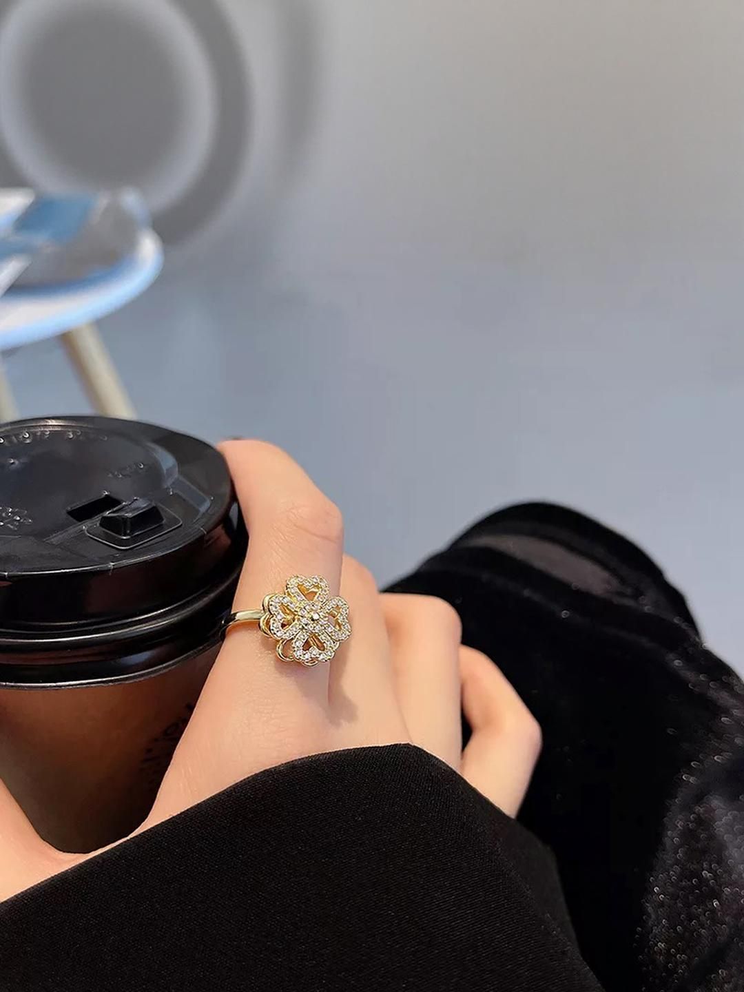 Buy DressBerry Gold_Plated Cubic Zirconia Studded Adjustable Floral Rotating Ring -  - Accessories for Women