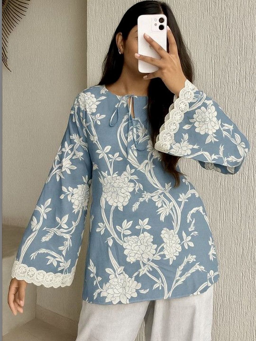 Yashwani Fashion Floral Print Tie-Up Neck Bell Sleeve Ruffles Top
