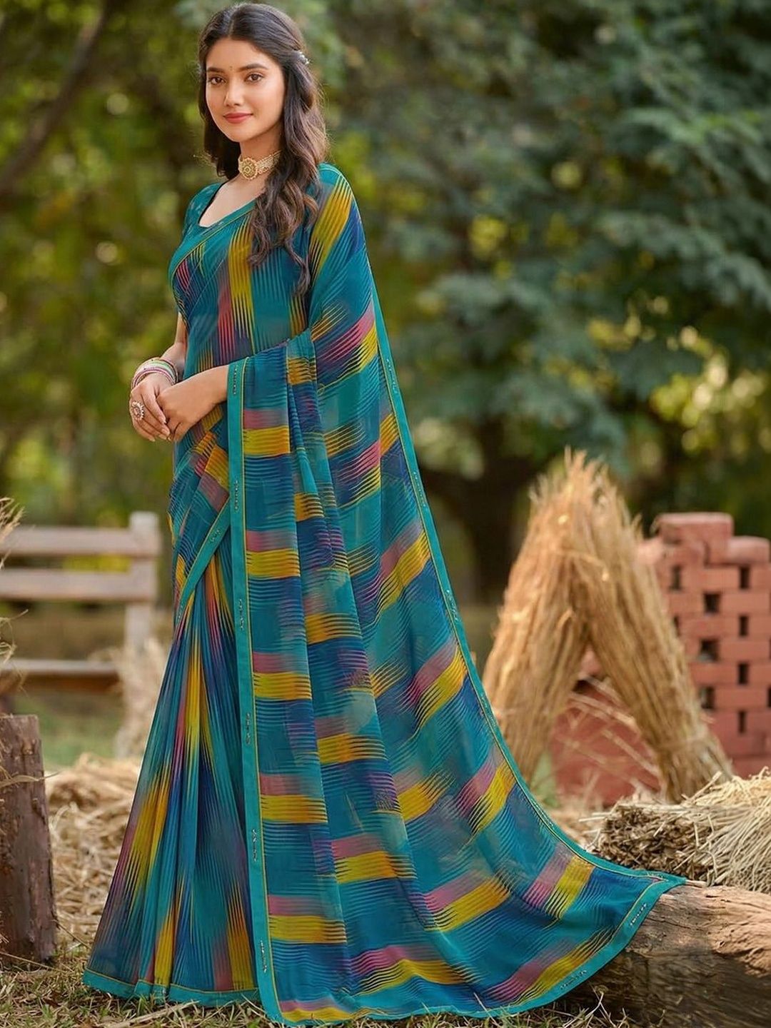Vishal Prints Sherpa Blue Printed Georgette Fancy Border Sarees