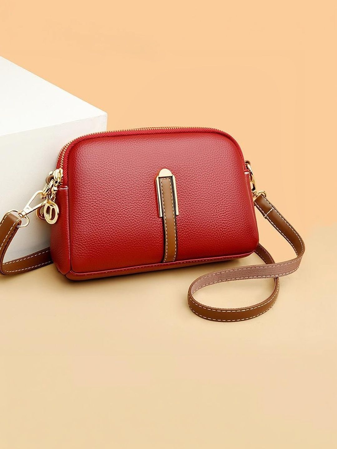 VENITY Textured Sling Bag
