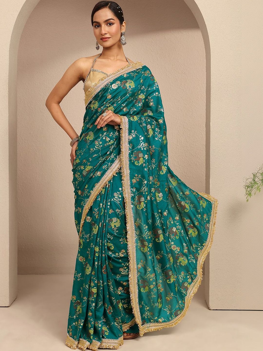 Libas Blue tribal printed saree with embellished border and a blouse piece