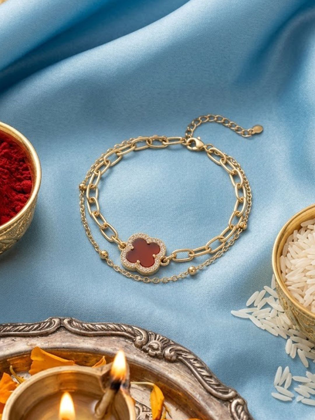 NVR Women Artrificial Stones Gold Plated Rakhi With Roli Chawal Chandan Mishri
