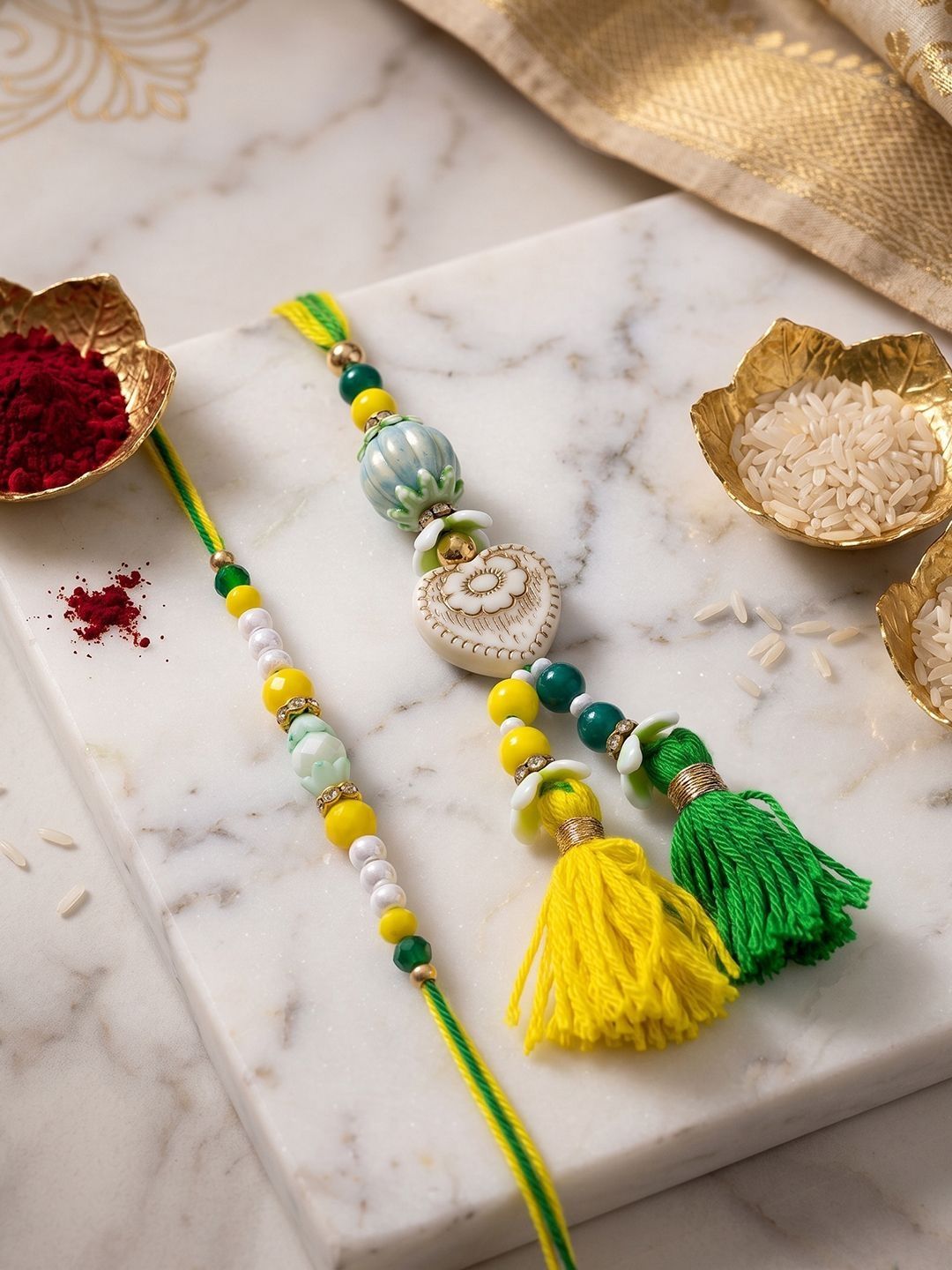 NVR Set Of 2 Green & Yellow Beaded Heart Shape Bhaiya Bhabhi Rakhi With Roli Chawal