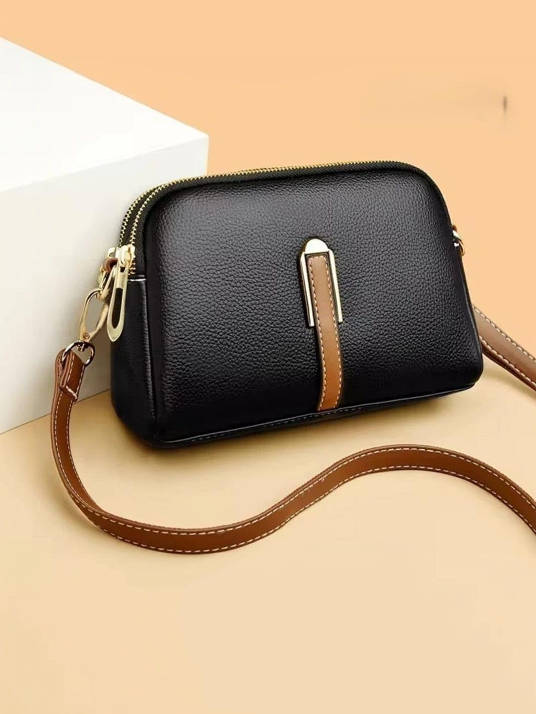 CNew Textured Leather Sling Bag