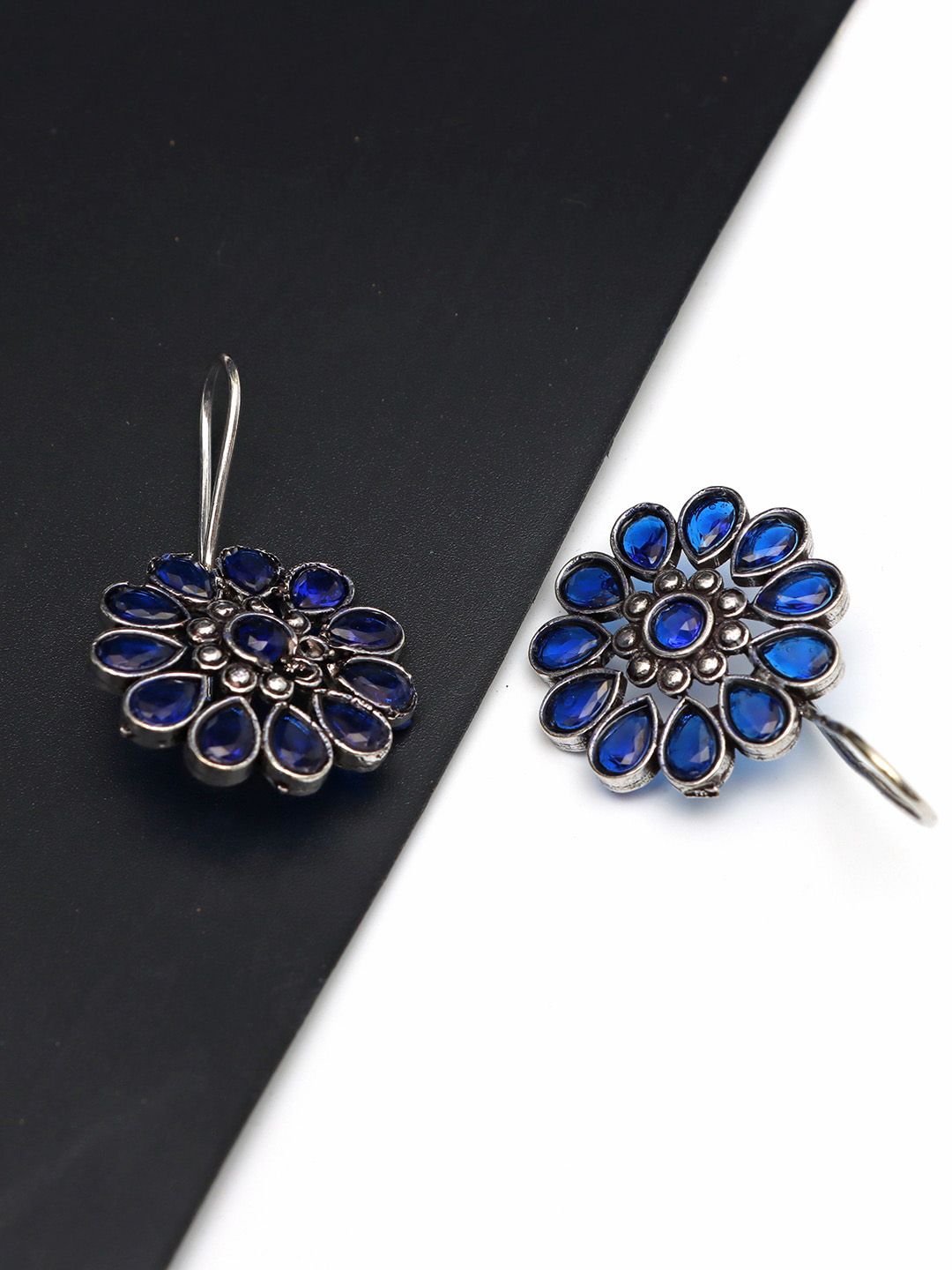 Ozanoo Silver Plated Oxidised Floral Stone Studded Drop Earrings
