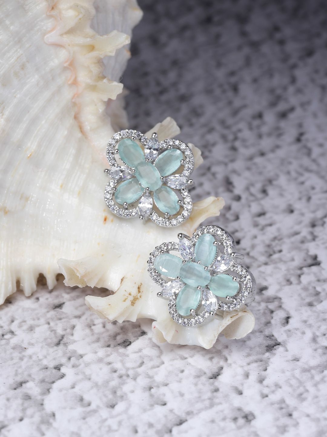 Floral Shaped Sea Green American Diamond Studded Rhodium Plated Stud Earrings
