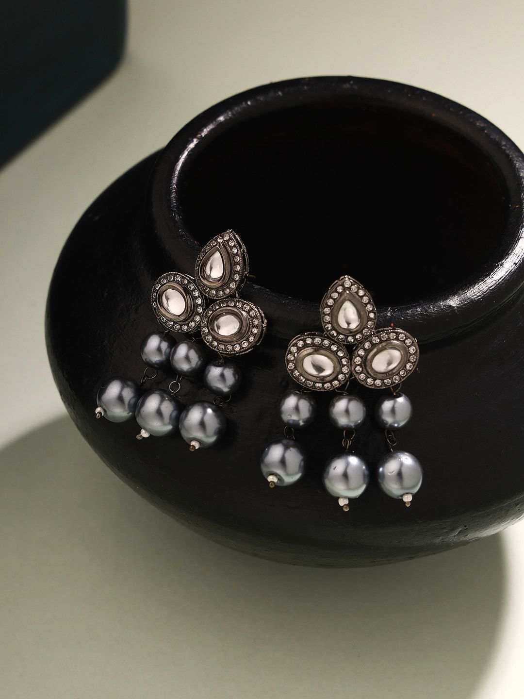 Priyaasi Black Silver-Plated Kundan Studded Contemporary Studs Earrings
