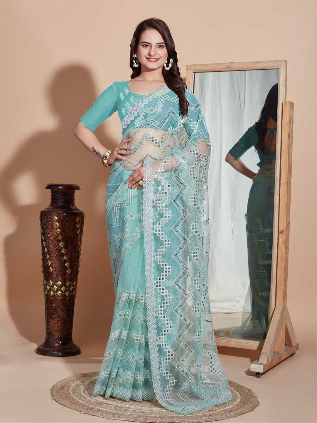 VAIRAGEE Geometric Embroidered Sequinned Net Saree