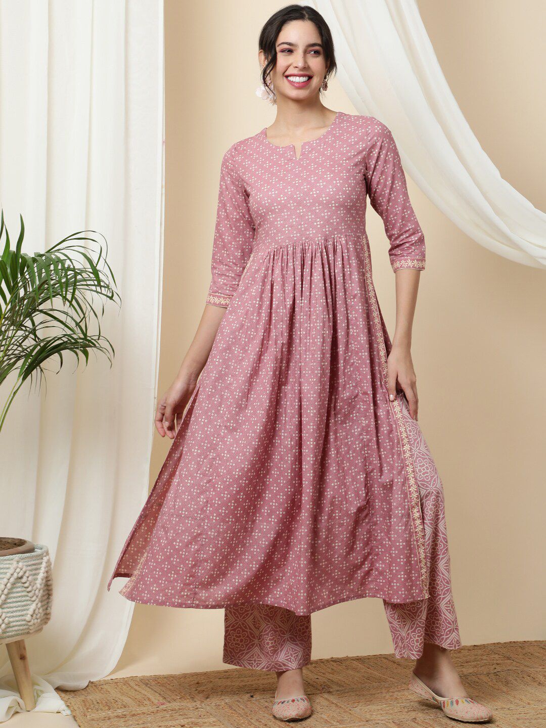 KIMAYRA Ethnic Motifs Printed Pleated A-Line Kurta with Palazzos