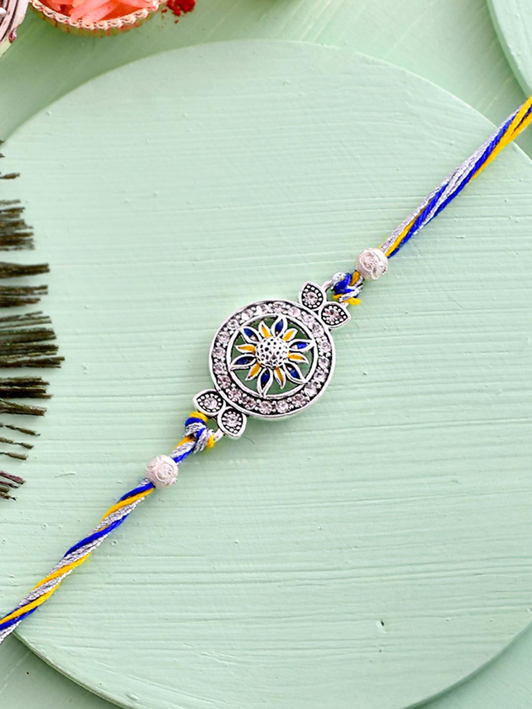 Blue Green And Silver Enamelled Thread Rakhi For Brother