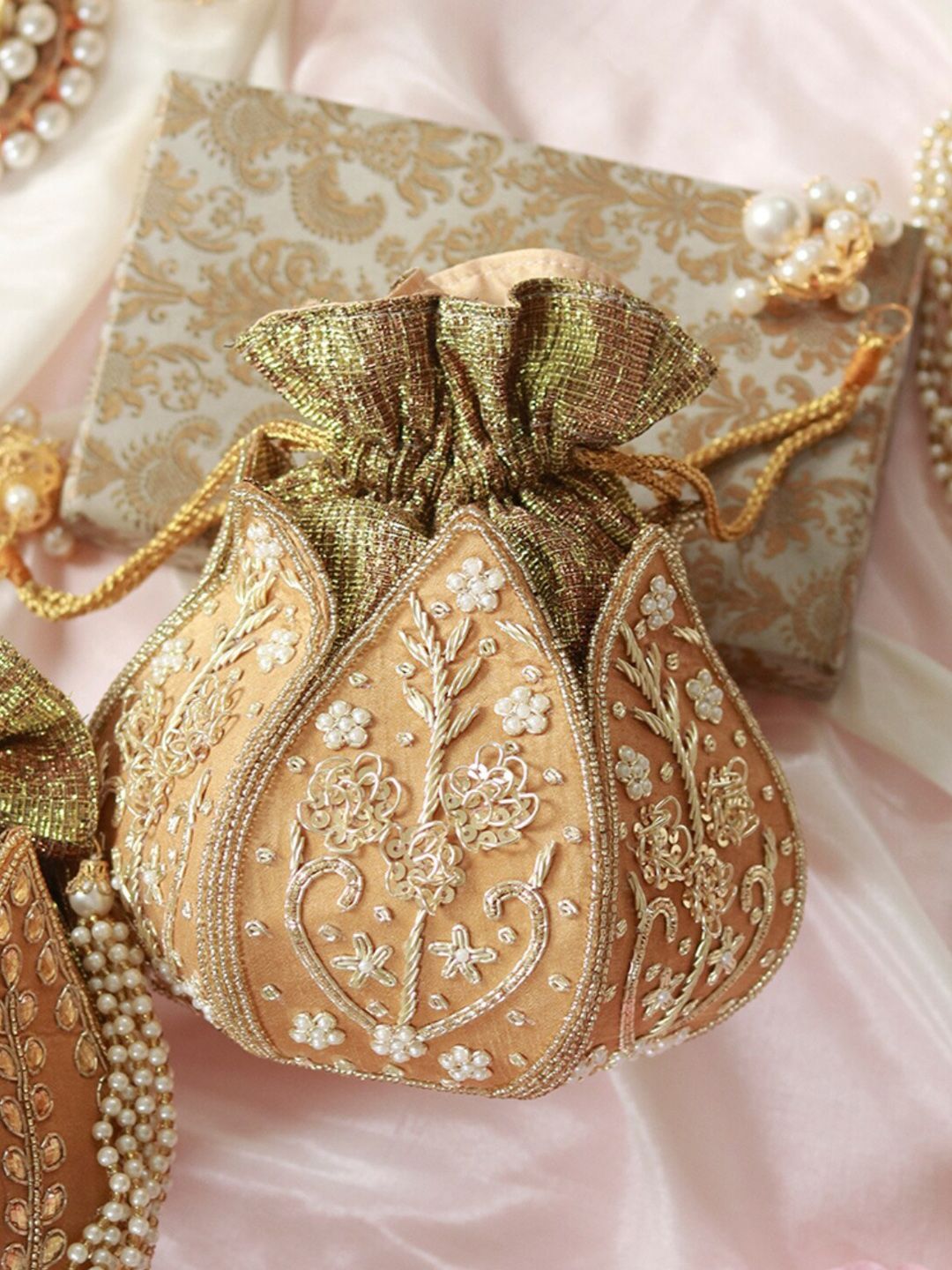 THE TAN CLAN Embroidered Tasselled Potli Clutch