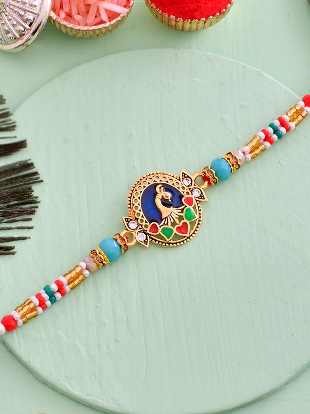 Colourful Thread Beaded Traditional Peacock Motif Rakhi For Brother