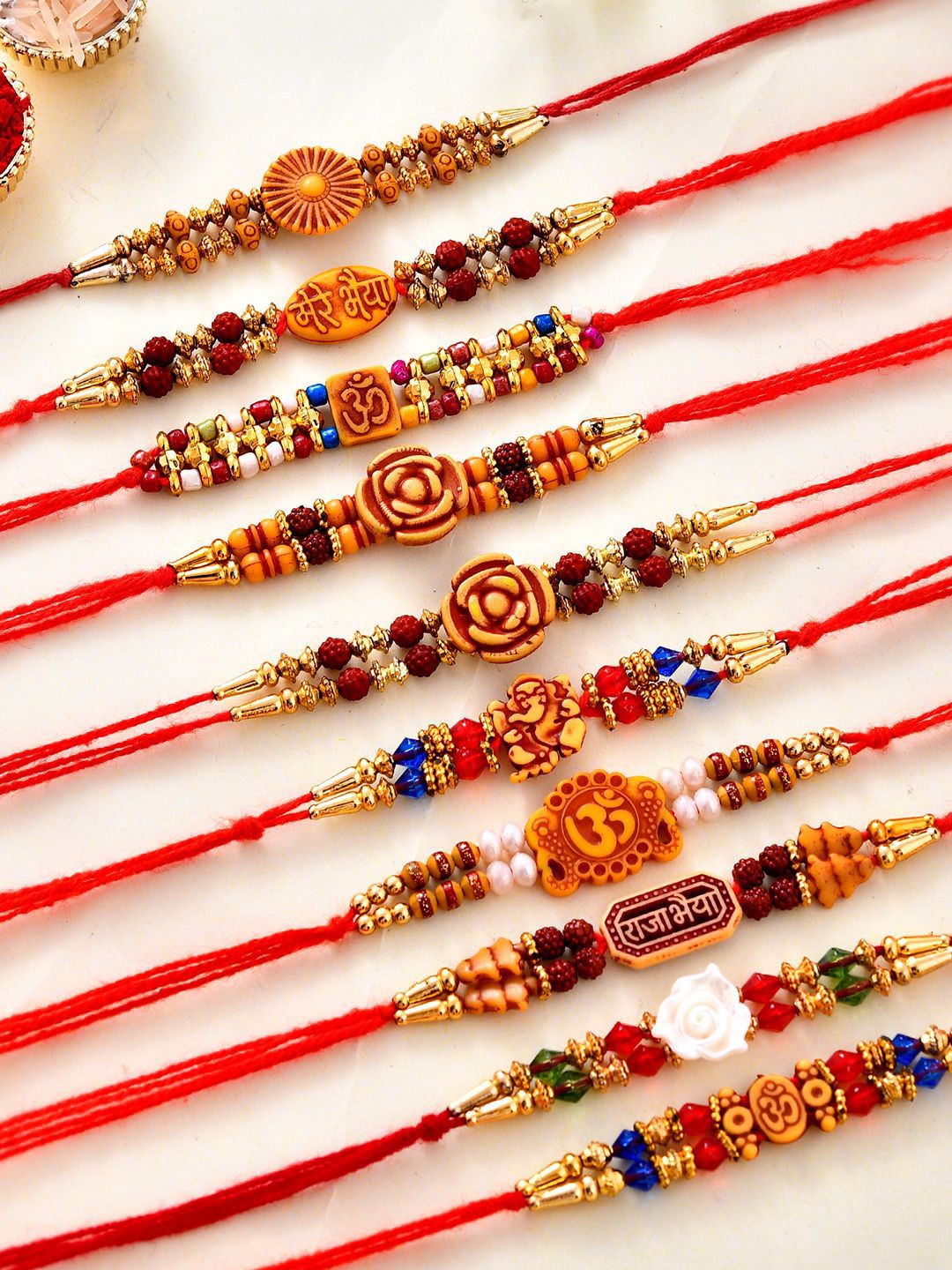 CraftVatika Set Of Rakhi 10 Beaded Rakhis With Greeting Card