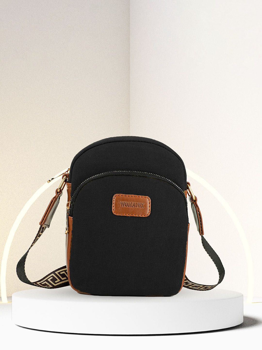 Womanix Structured Handheld Bag with Tasselled