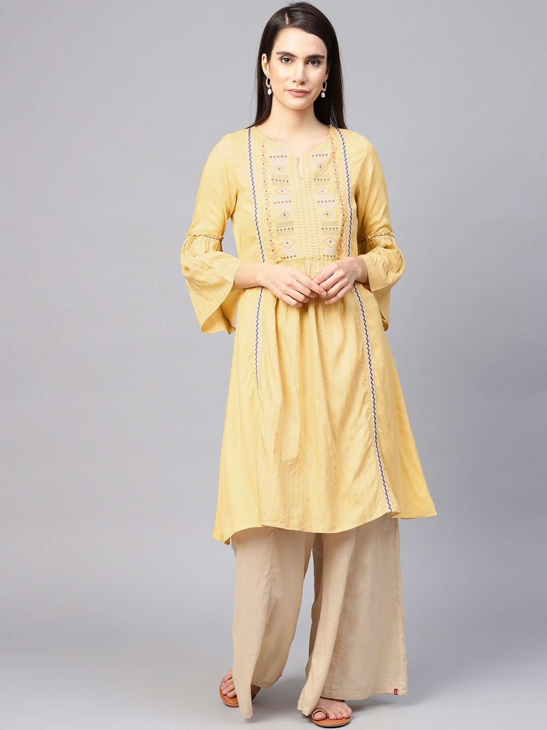 W Women Yellow & Silver Yoke Design A-Line Sustainable Kurta