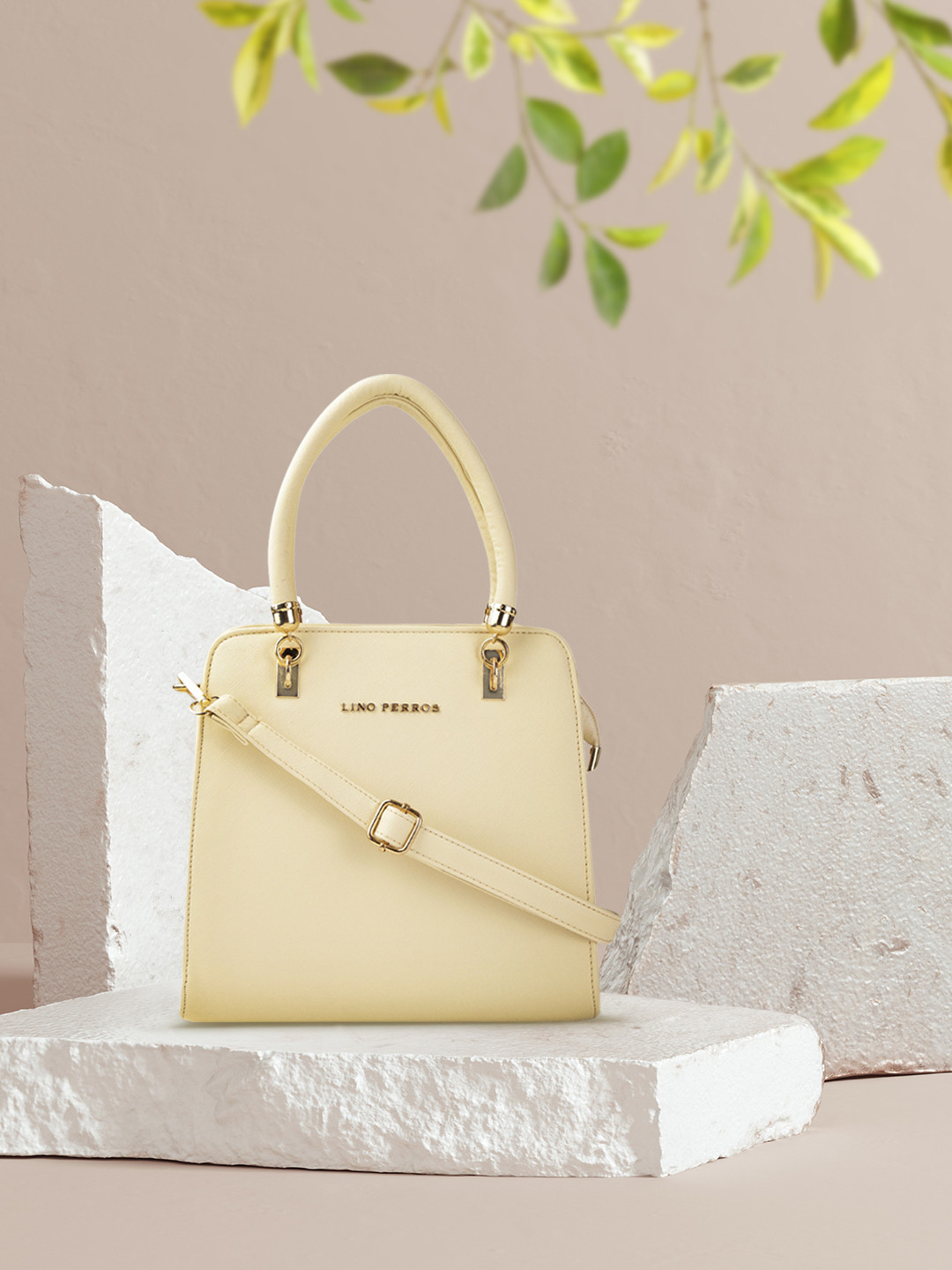 Lino Perros Off-White Solid Handheld Bag