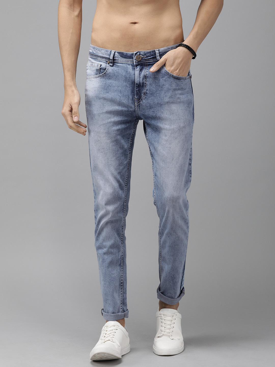 The Roadster Lifestyle Co Men Blue Tapered Fit Mid-Rise Clean Look Stretchable Jeans