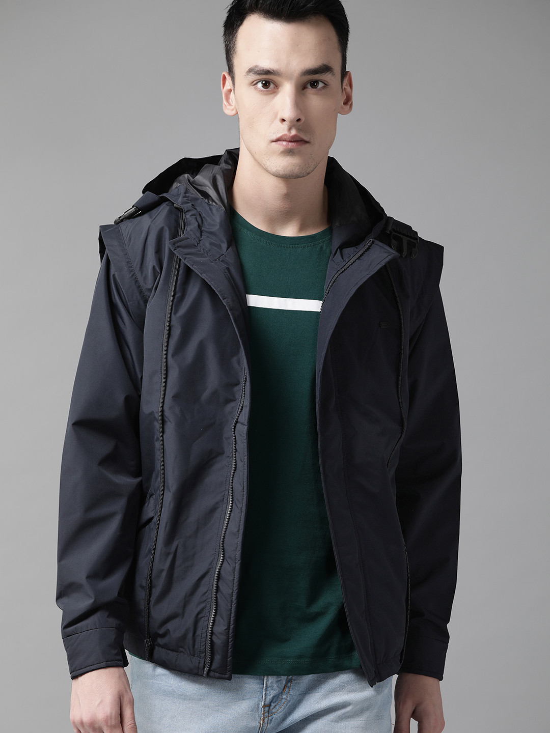 The Roadster Lifestyle Co Men Navy Blue Solid Hooded Convertible Jacket cum Backpack