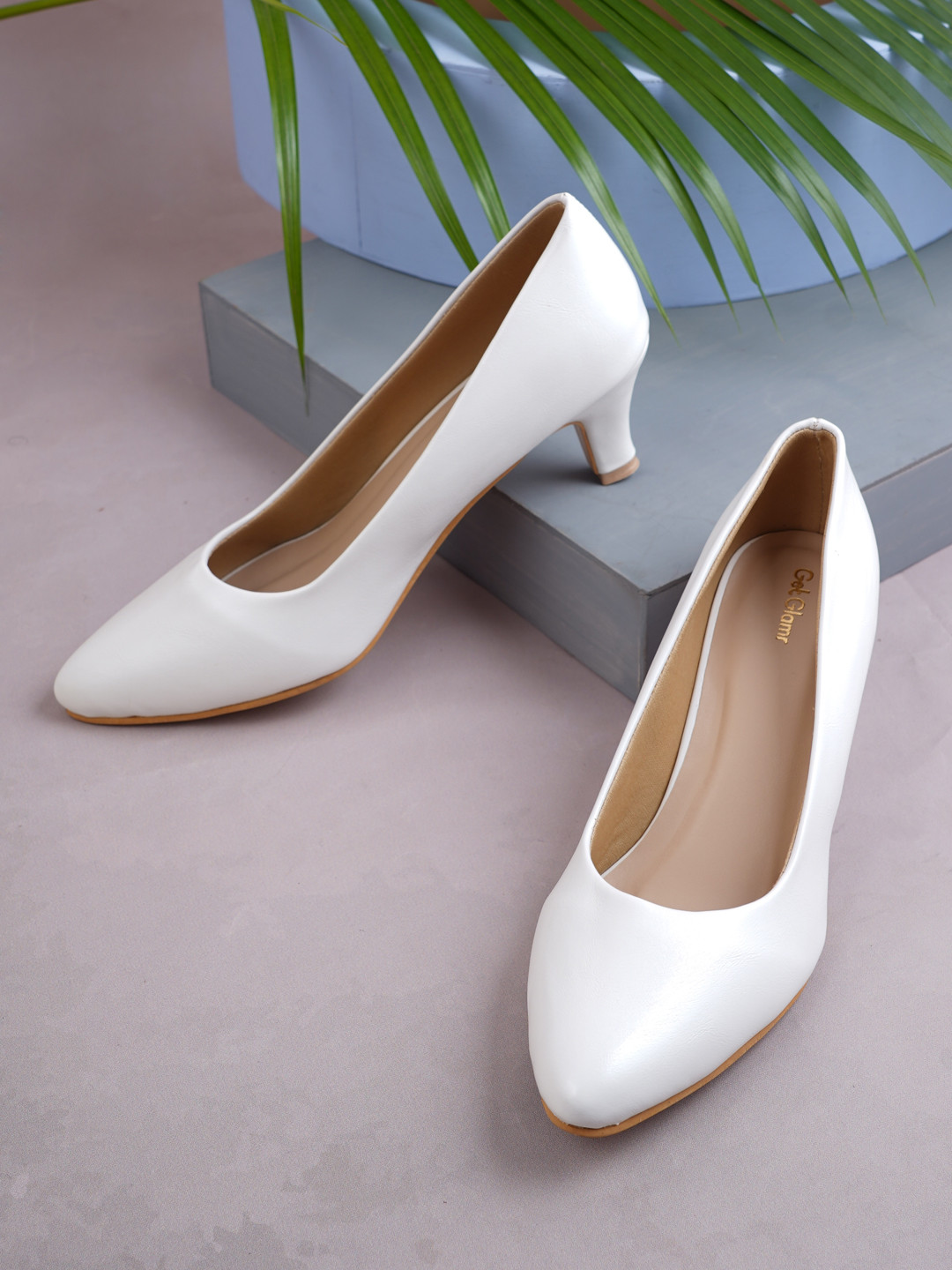 Get Glamr Women White Solid Pumps