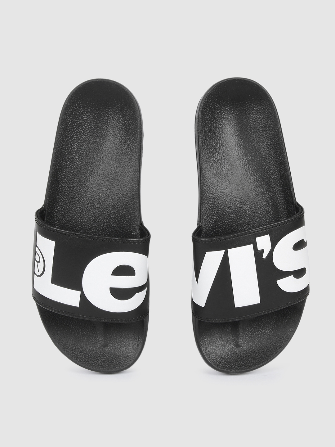 Buy Levis Men Black & White Printed Sliders - Flip Flops for Men 11368800 |  Myntra