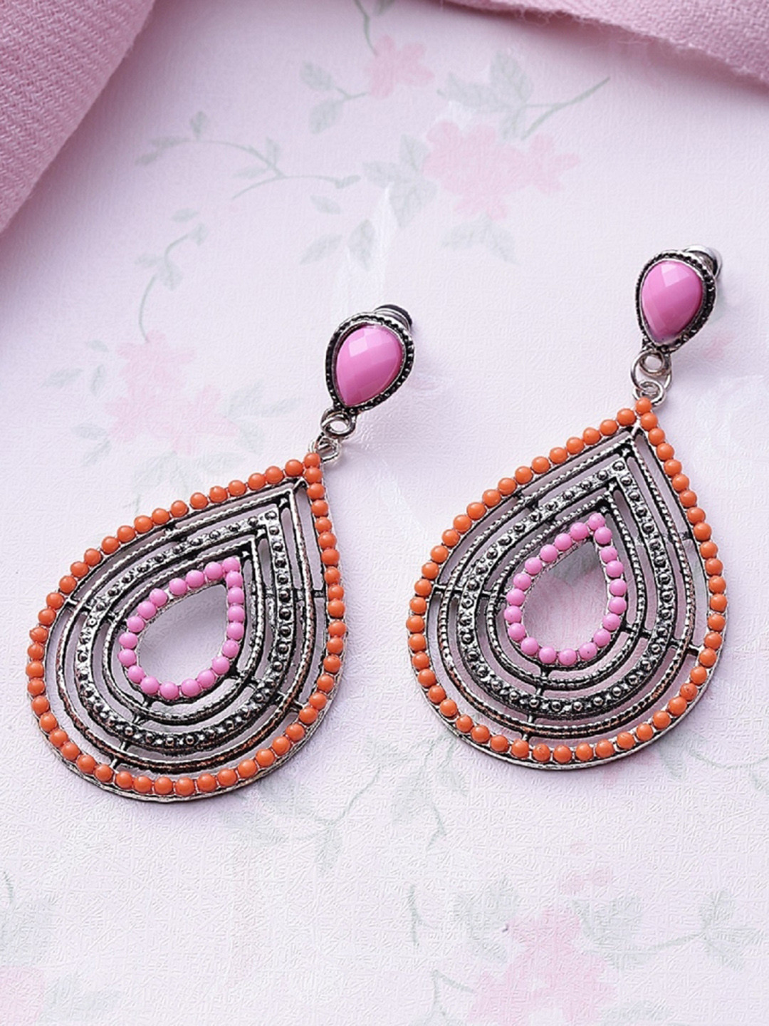 ToniQ Silver-Toned & Orange Teardrop Shaped Drop Earrings